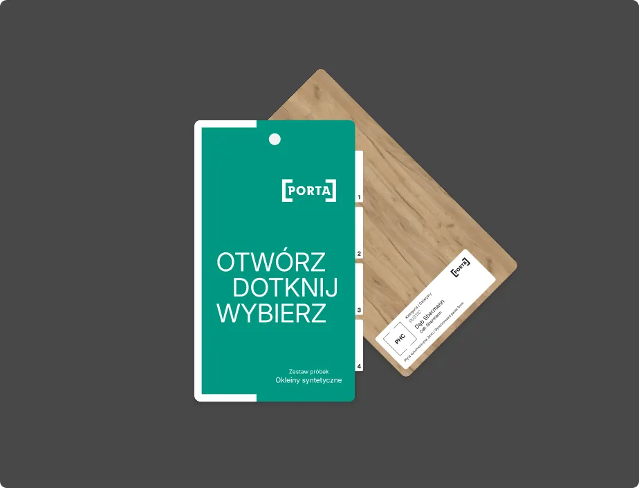 Zielona karta wzornika z hasłem „Otwórz, dotknij, wybierz” na próbce okleiny
