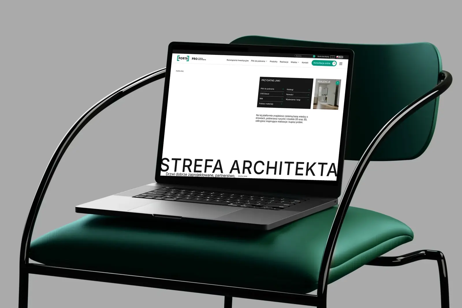 Strefa Architekta Porta na laptopie postawionym na krześle.