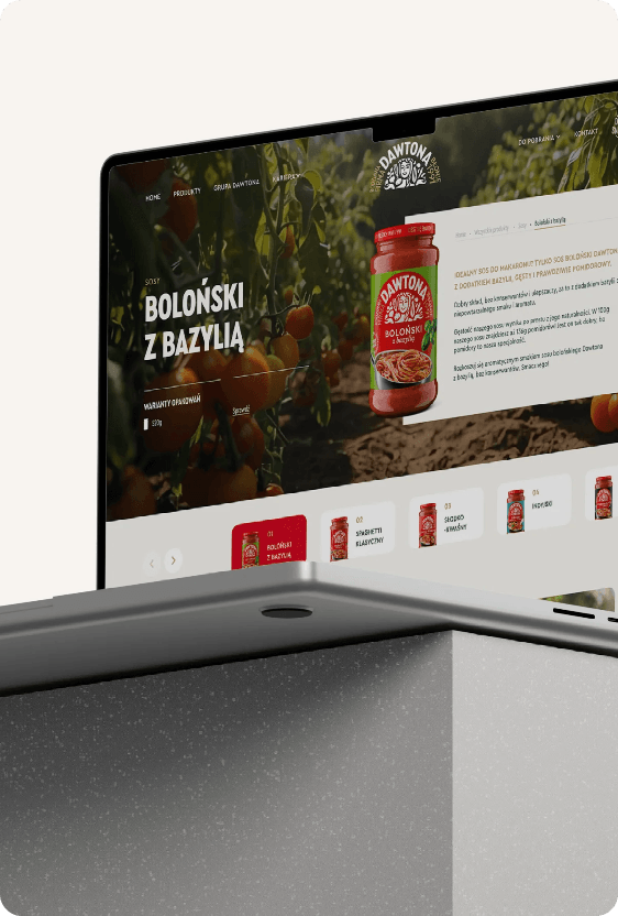 Strona Dawtony z sosem „Boloński z bazylią” na laptopie